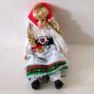 Porcelain doll in traditional German garb 15"